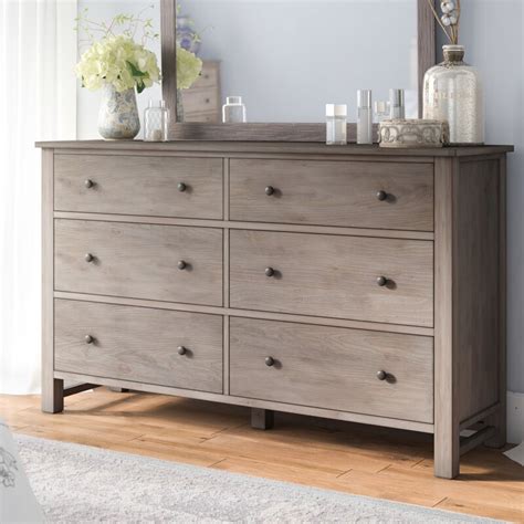 Set on smooth-operating plastic drawer glides, this chest's drawers have two colored knobs, which are removable if you want to switch up the look. . Bedroom dressers wayfair